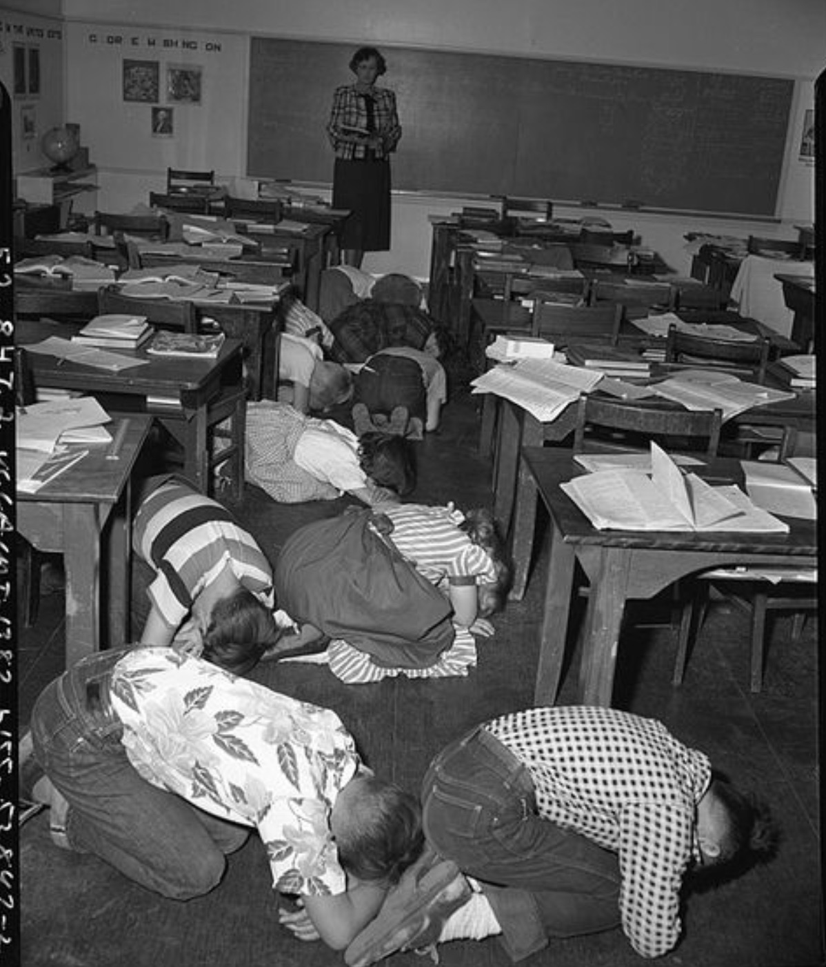 Duck and cover drill in a school in Los Angeles, 1951 
